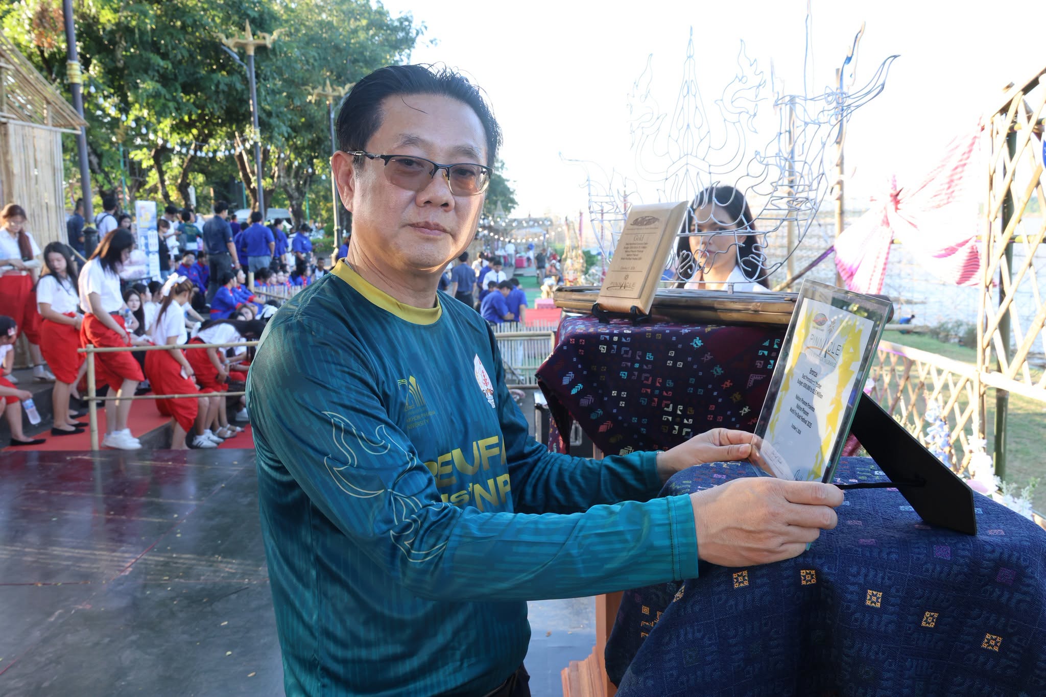 Nakhon Phanom University Celebrates Global Success with Victory Parade for Nakhon Phanom Illuminated Boat Festival